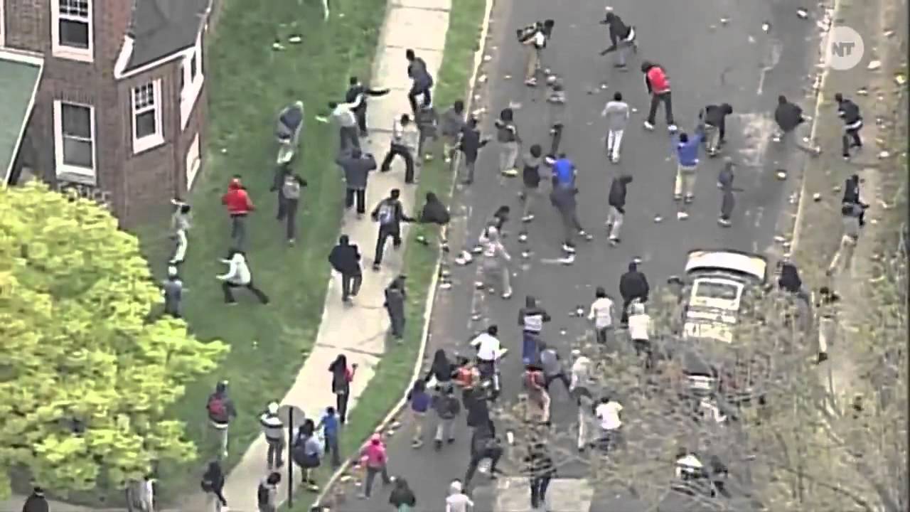 Police Throws Rocks Back at Protesters In Baltimore