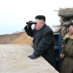 Kim JOng UN with binoculars