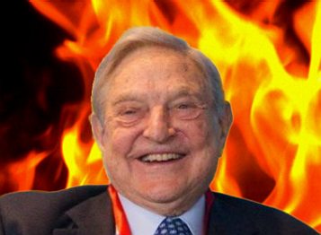 Soros in front of fire